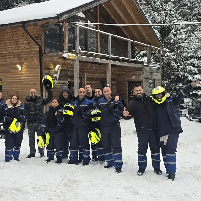 Snowmobile ride through snowy Carpathian forests near Azuga — 1