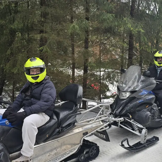 Snowmobile ride through snowy Carpathian forests near Azuga — 4